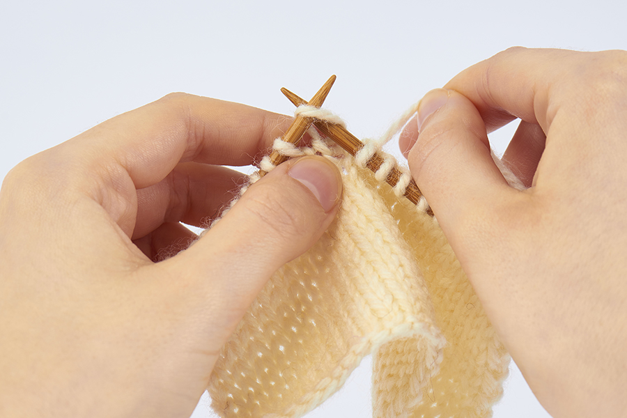 Knitting decrease, skpo, slip knit pass over step 1