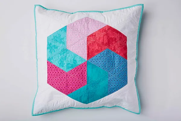 Patchwork triangles hexagon cushion