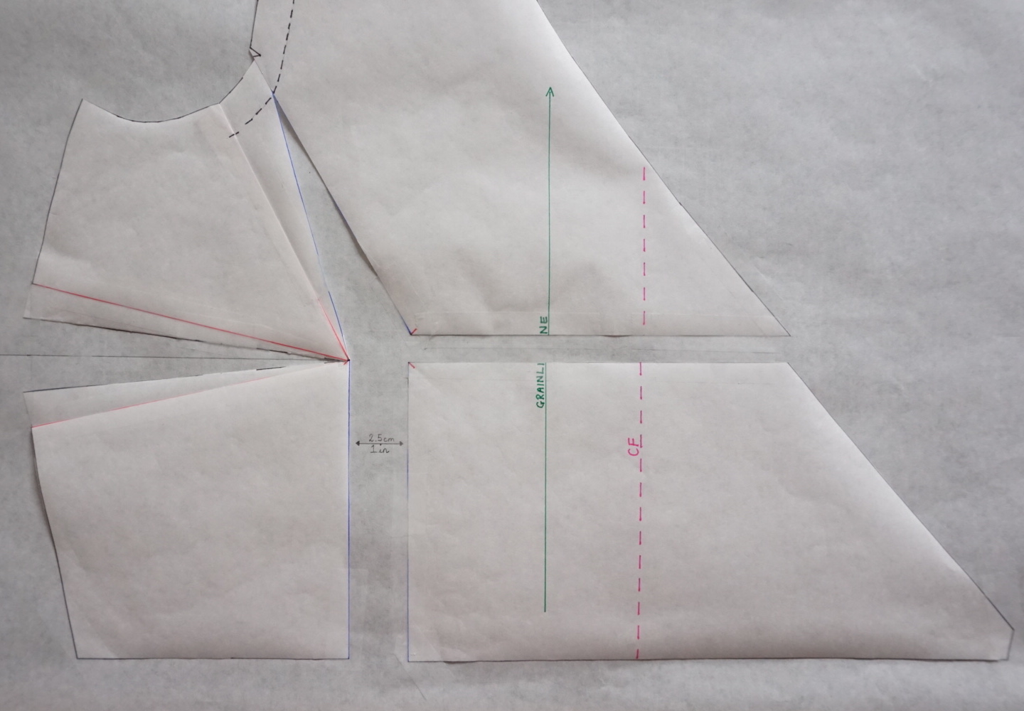 Move the lower piece down to align the waist seam, ensuring the grainline remains straight