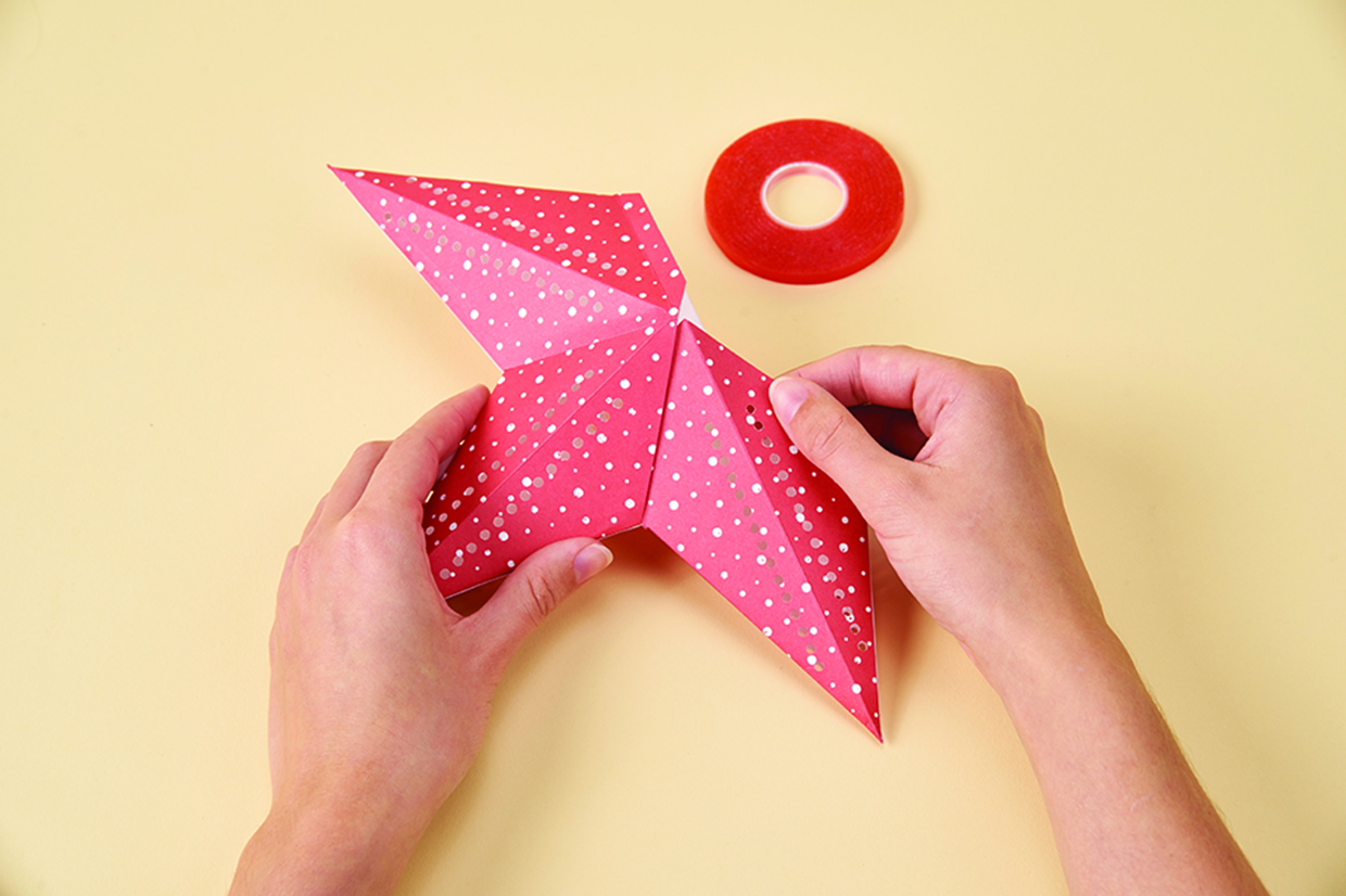 How to make a Christmas star out of paper 3