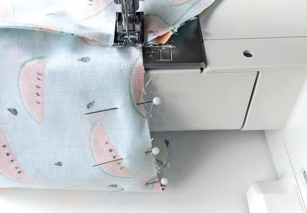 Using one continuous stitch starting from the base of the flap, sew the flap and top of the bag together, leaving a 5cm (2in) opening at the front.