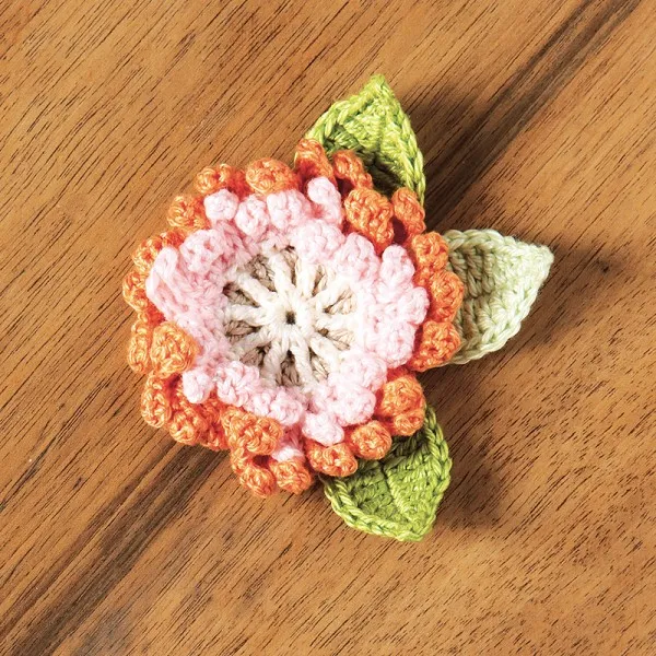 Crochet corsage pattern orange flower