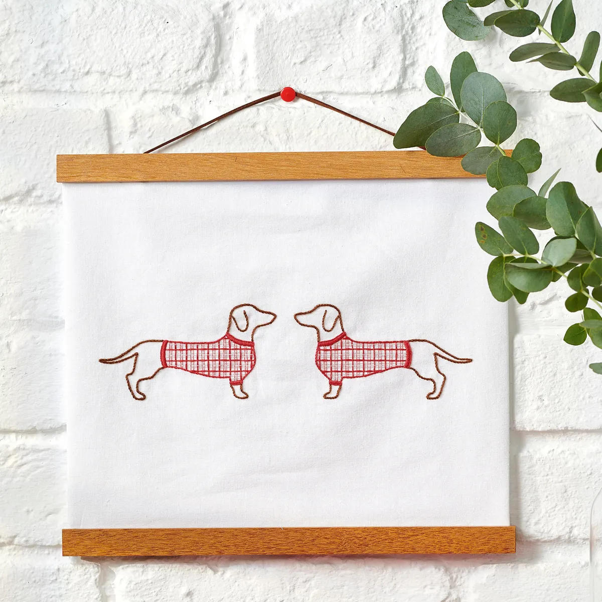 Tartan sausage dog banner from Love Embroidery issue 19