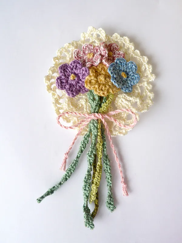 Crochet doily flower coursasge