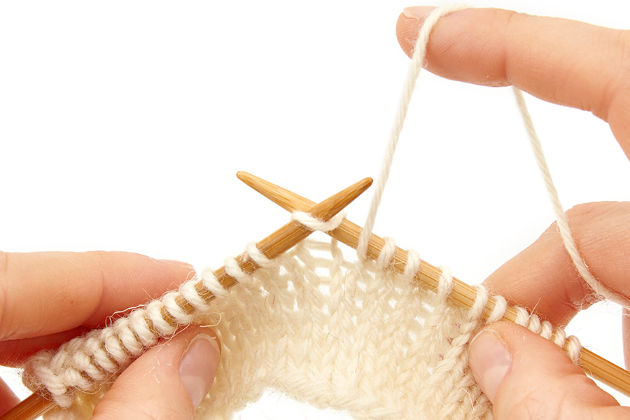 Yarn over knitting increase step three