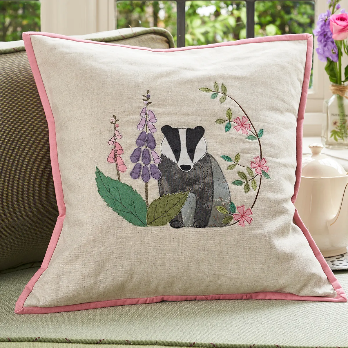 Applique badger cushion