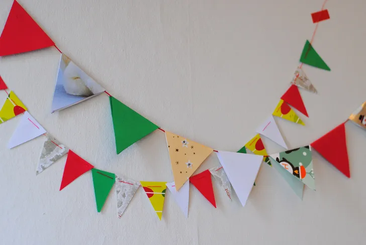 Recycle Christmas cards into holiday garlands