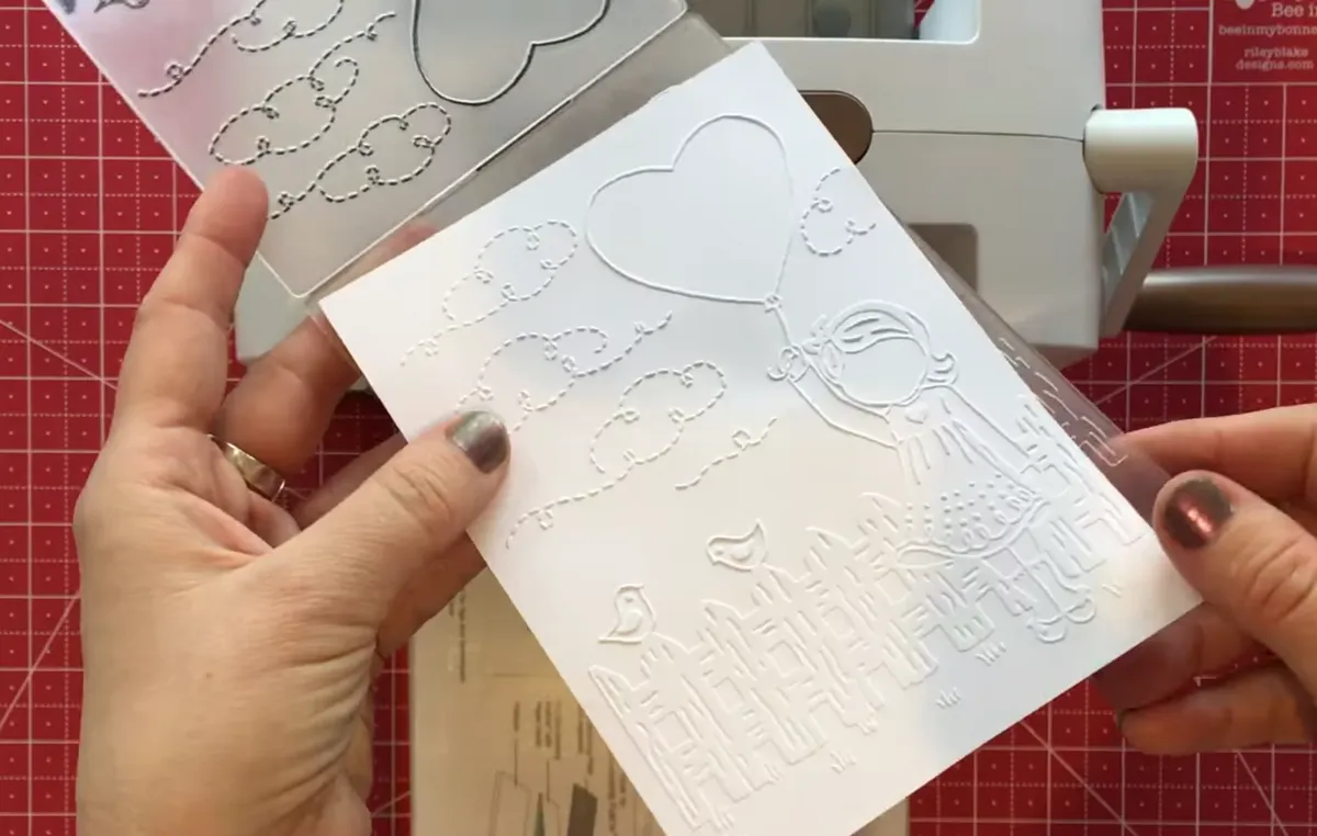 Use your die cutting machine to emboss paper and card