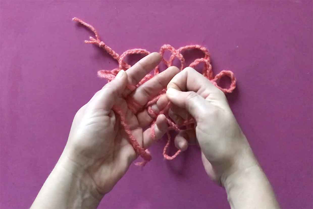 how to do finger knitting step 5