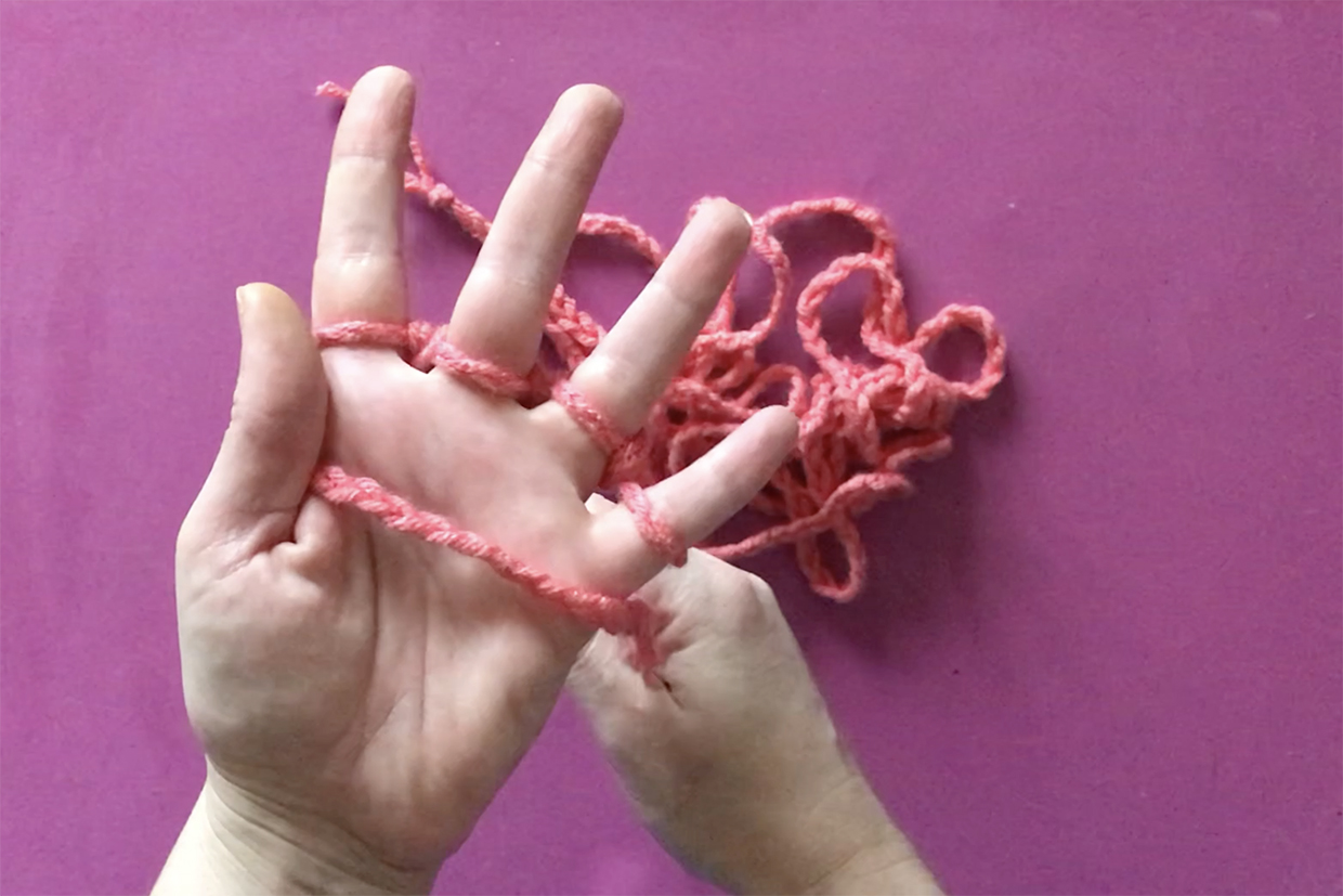 how to do finger knitting step 6