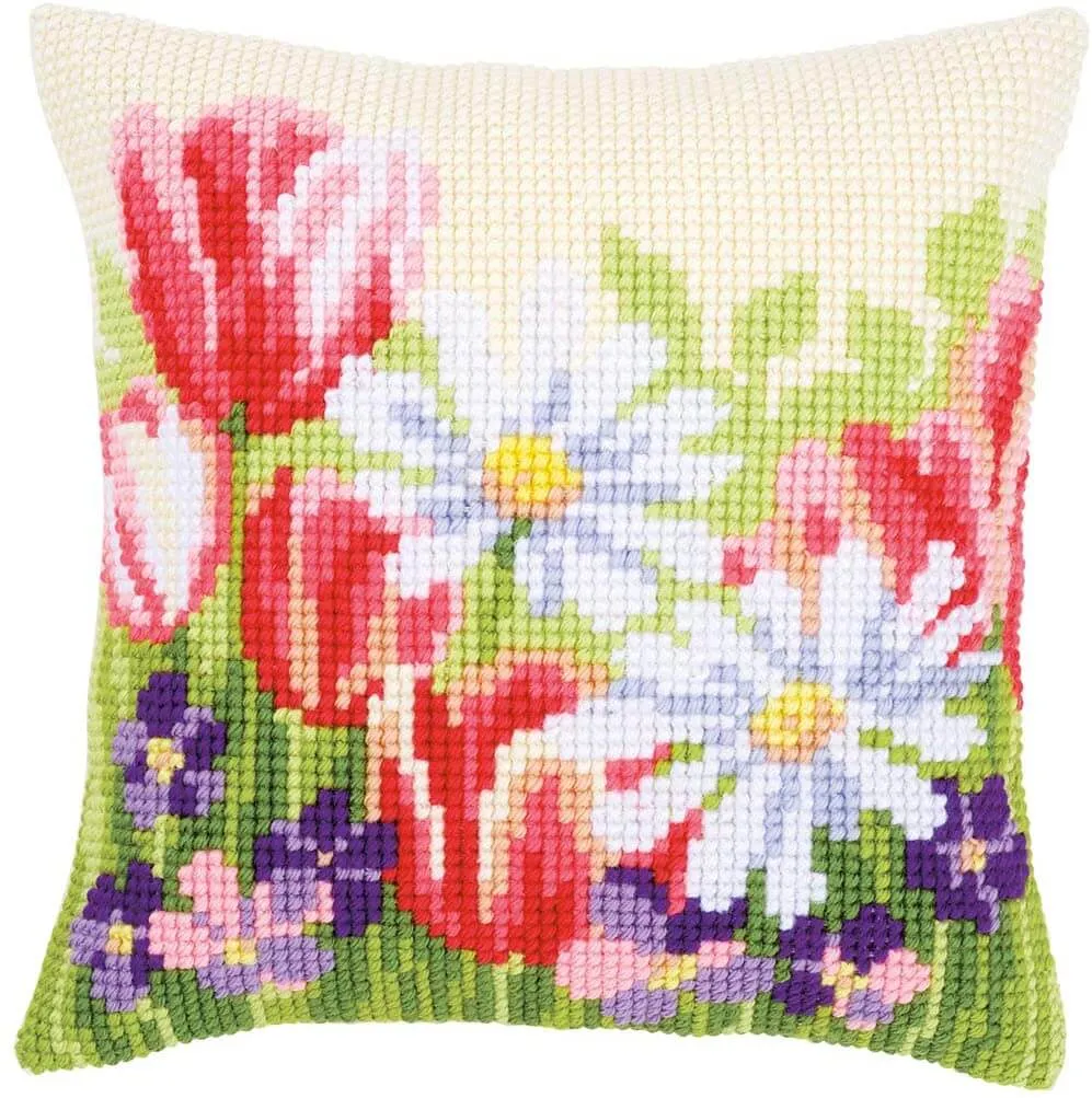 spring flowers cross stitched onto a cushion