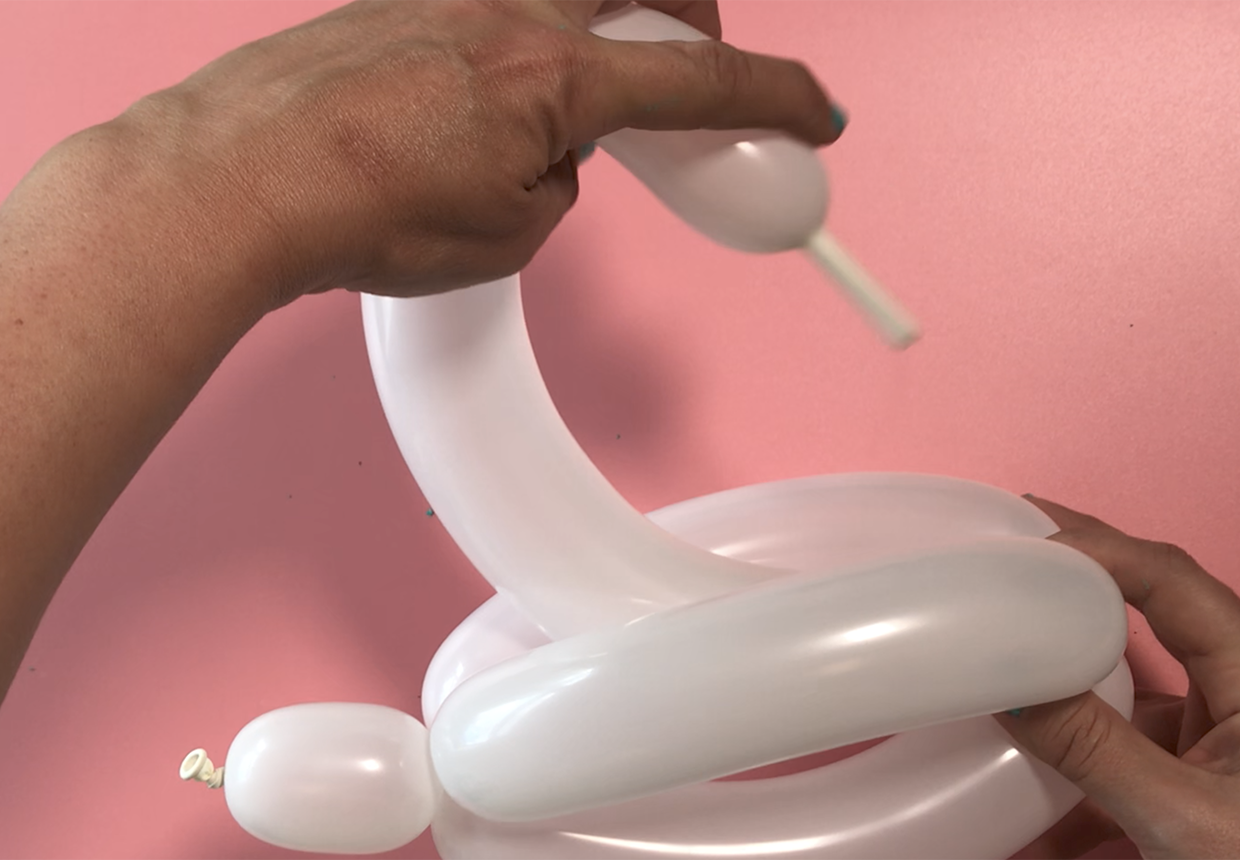 How to make a balloon swan step by step step 11