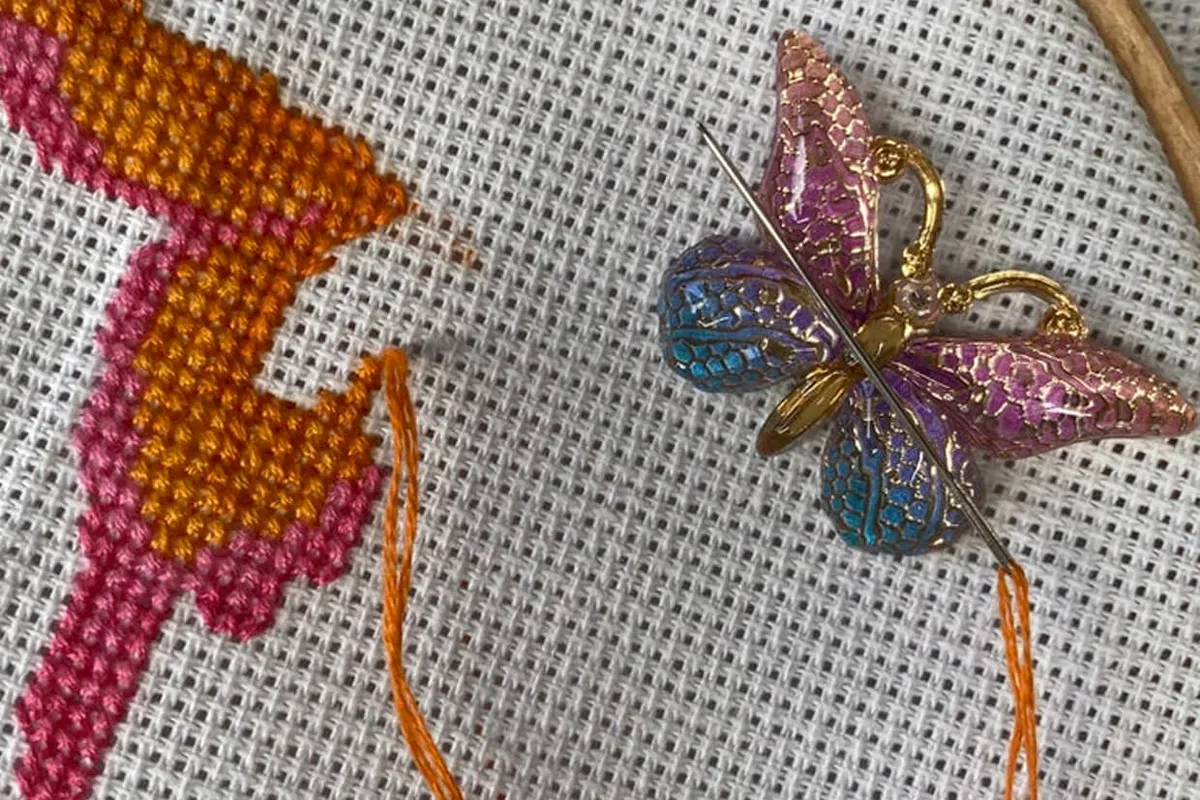 needle minder butterfly