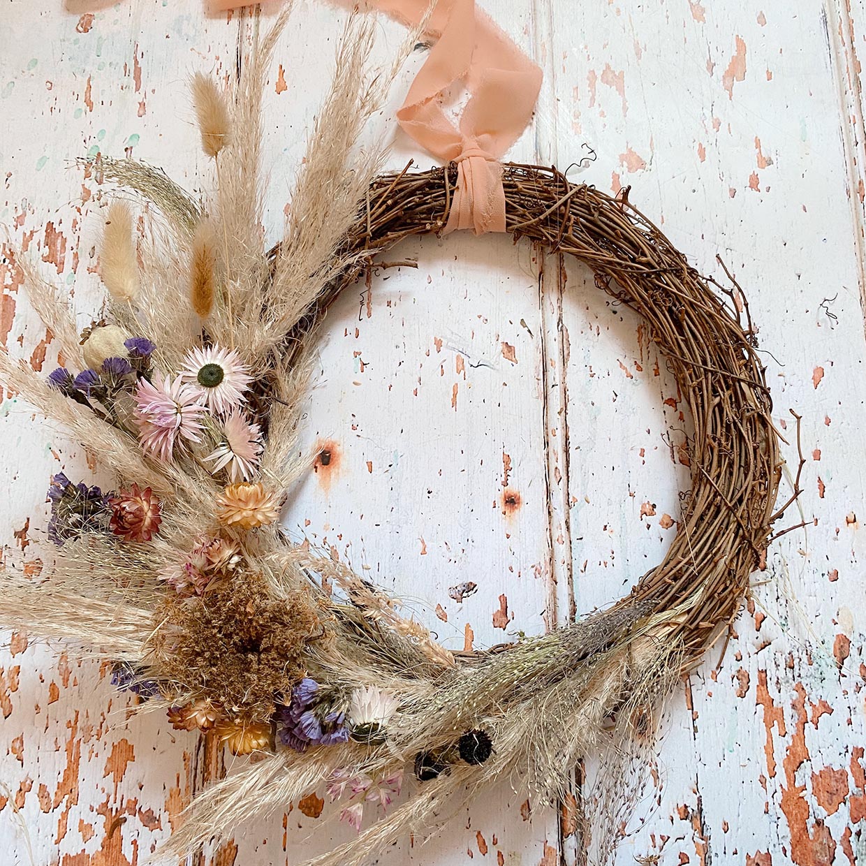 DIY Fall wreath hang your wreath with a pice of ribbon