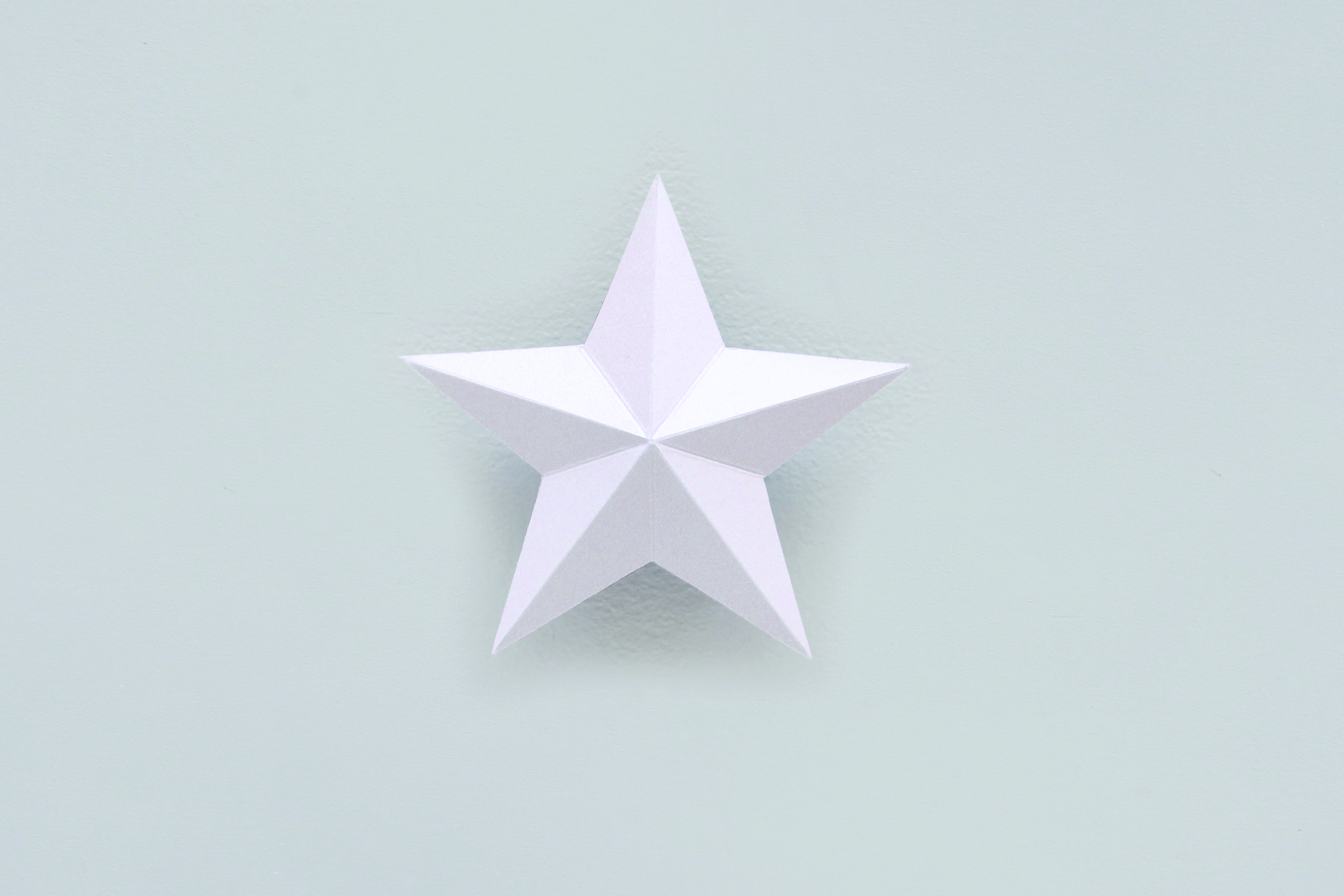 How to make a paper origami Christmas star step22