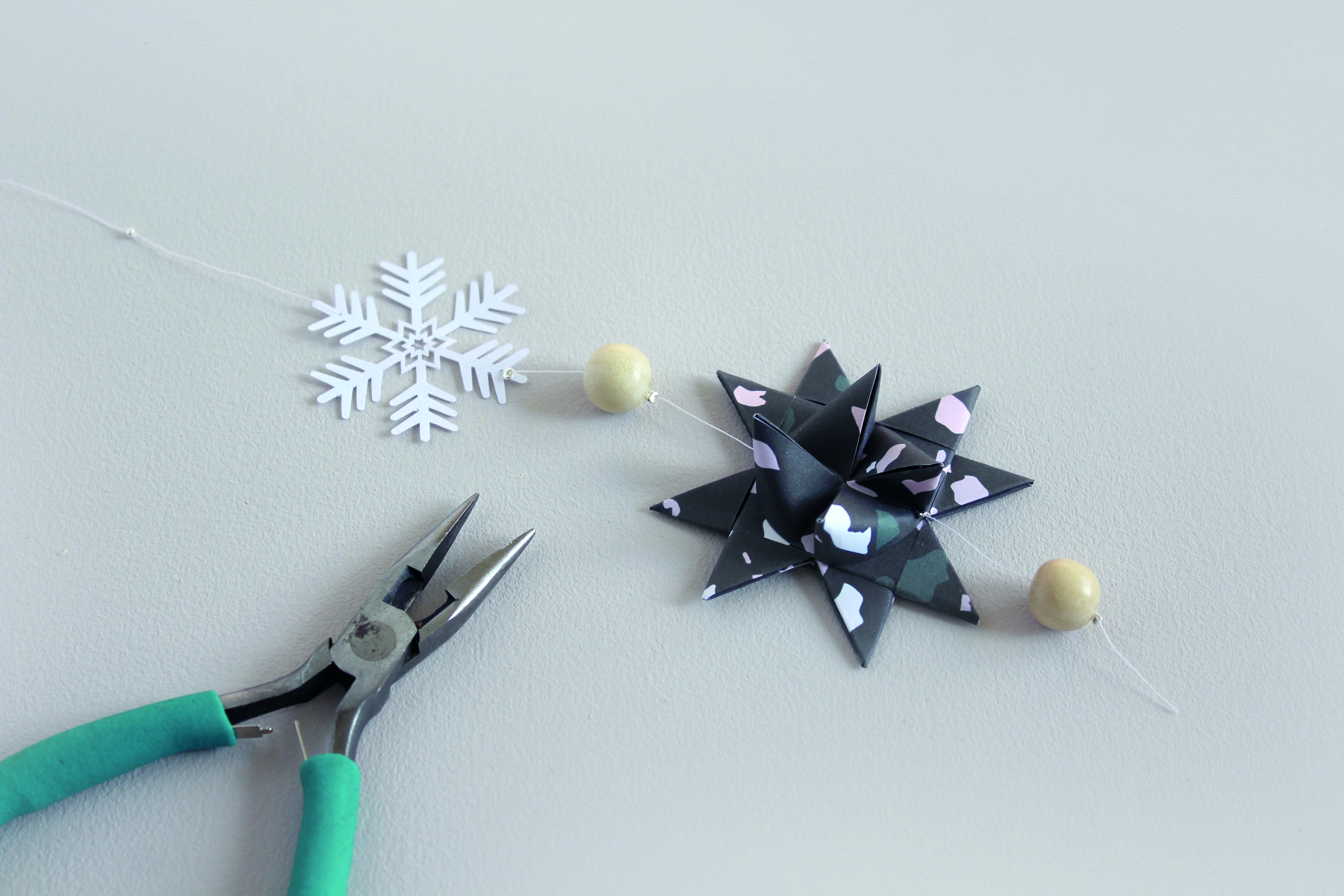 How to make a paper origami Christmas star step27
