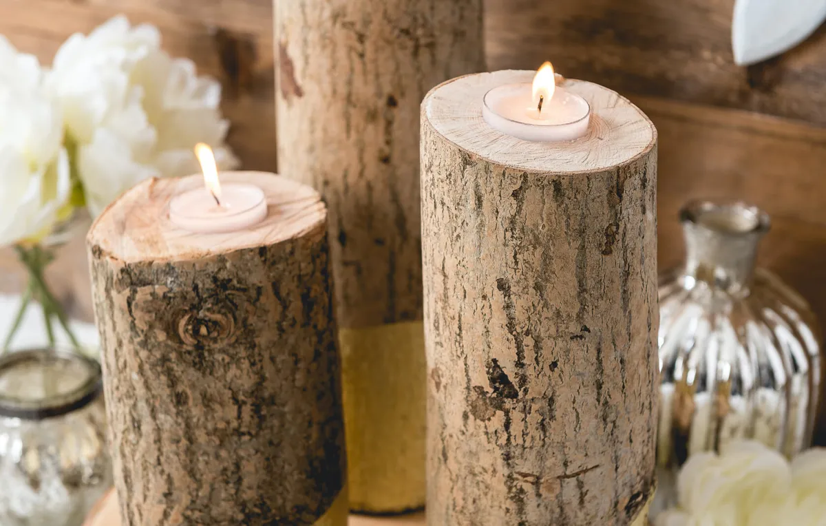 Log candle holders - on, portrait