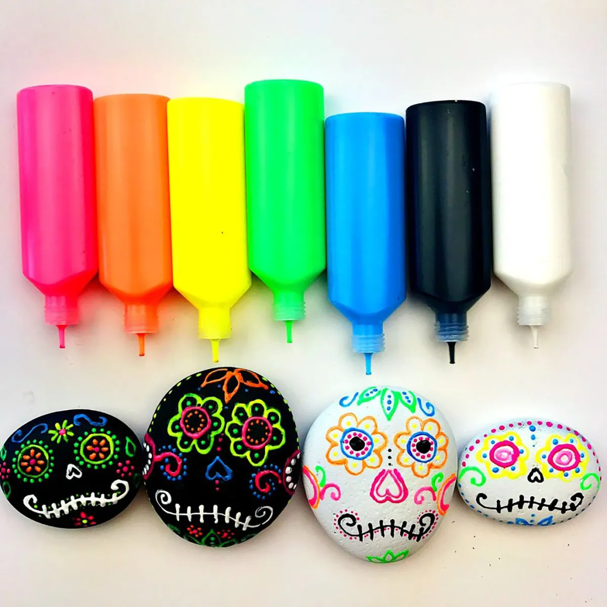 Halloween rock painting ideas – puffy paint sugar skulls