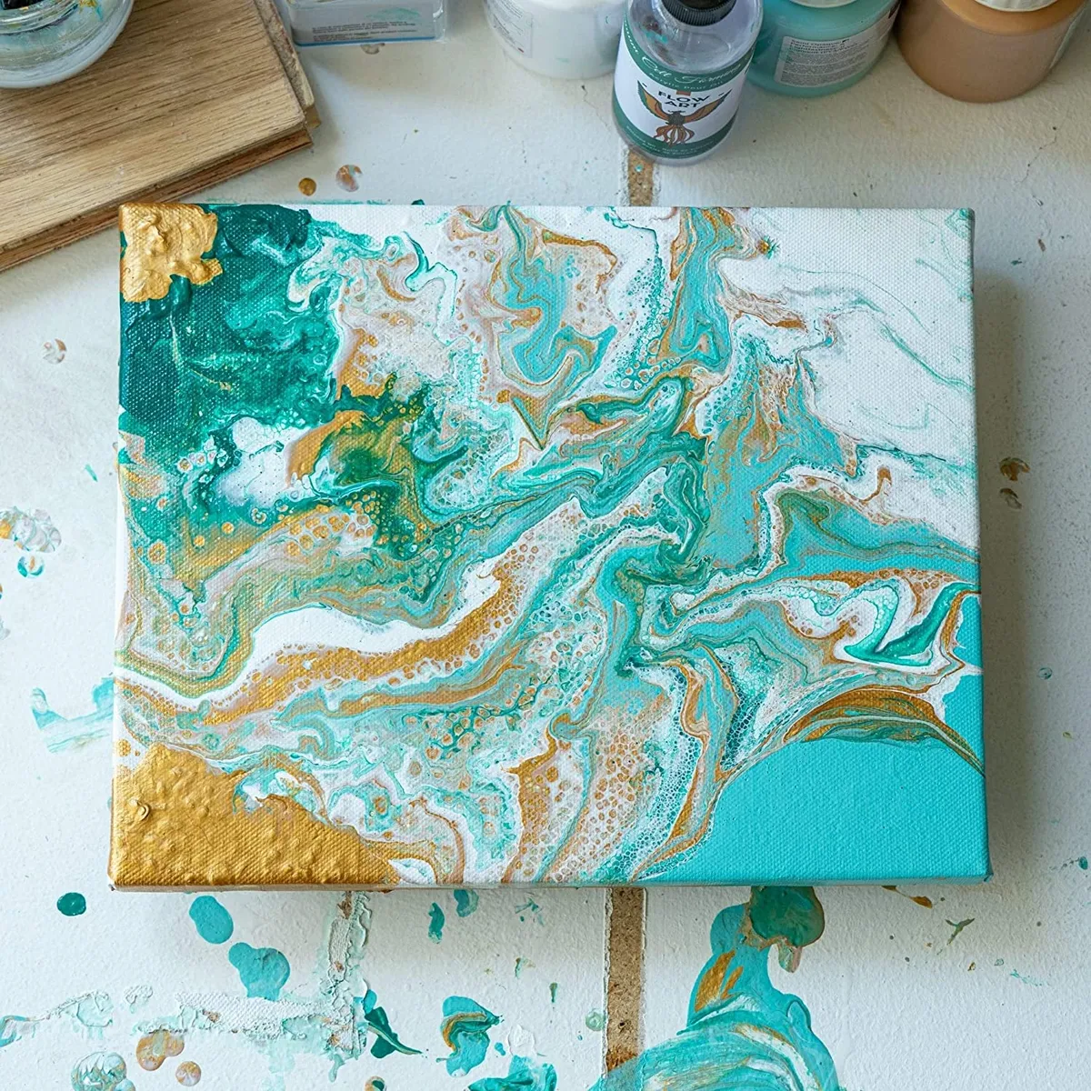 Try acrylic pour painting and go with the flow