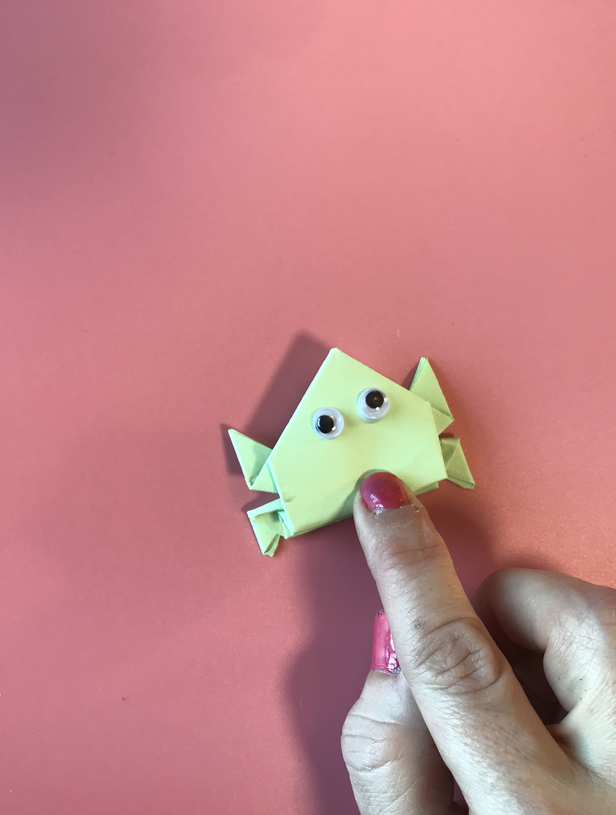 Origami jumping frog