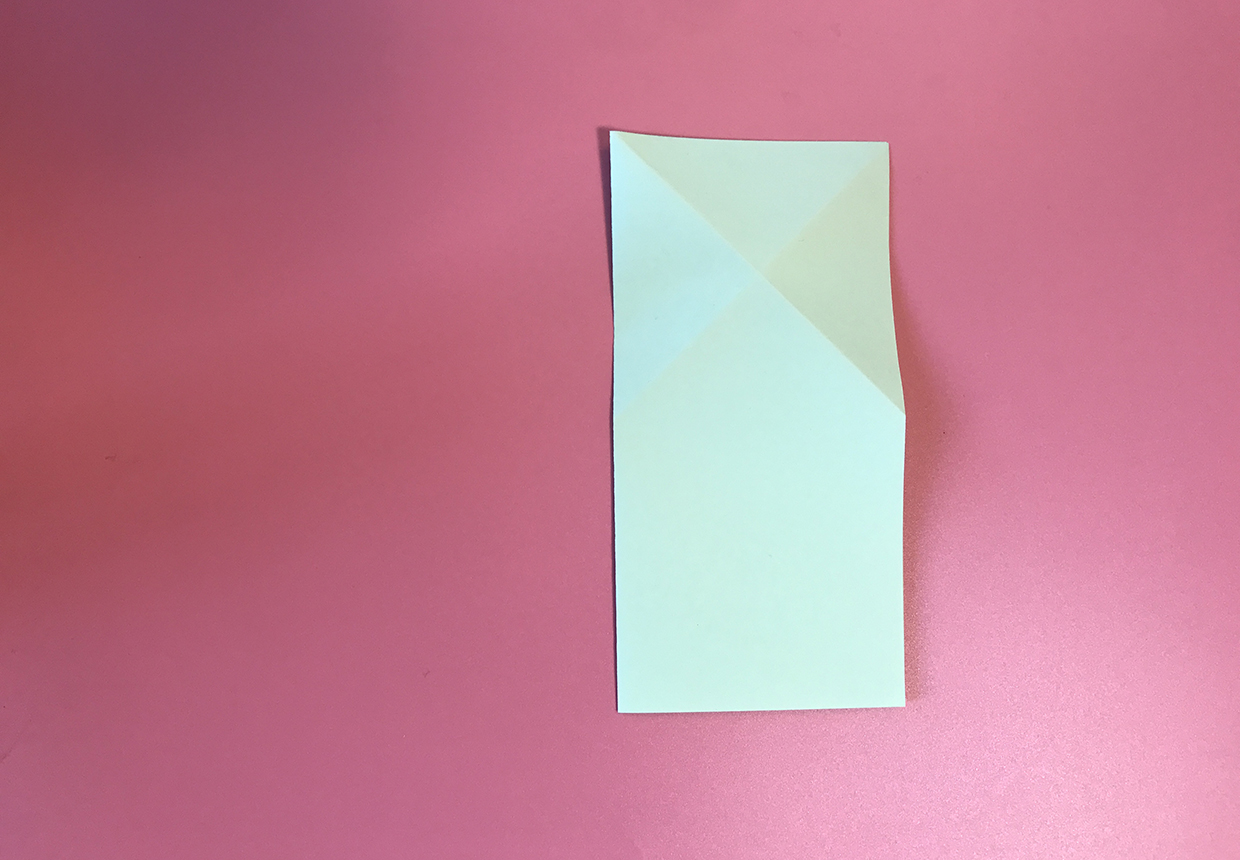 Unfold and flip the paper upside down