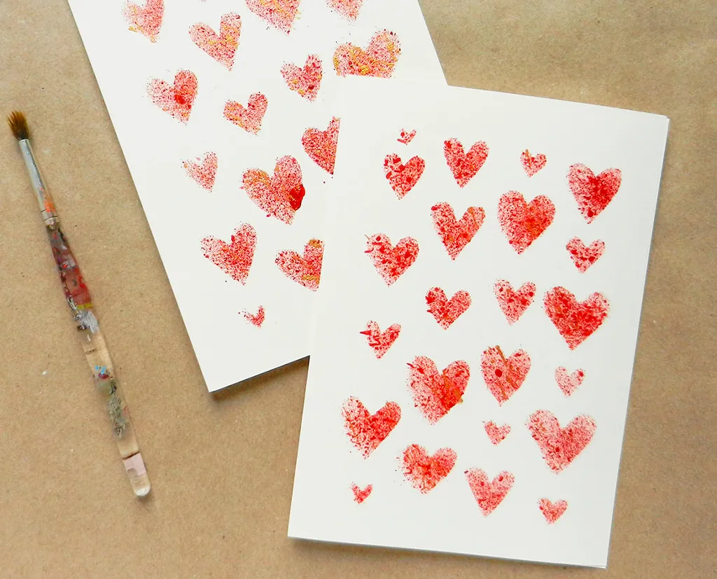 homemade valentine card with painted red hears