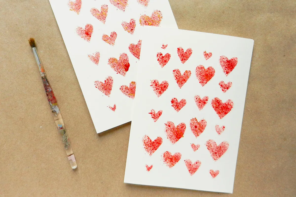 homemade valentine card with painted red hears