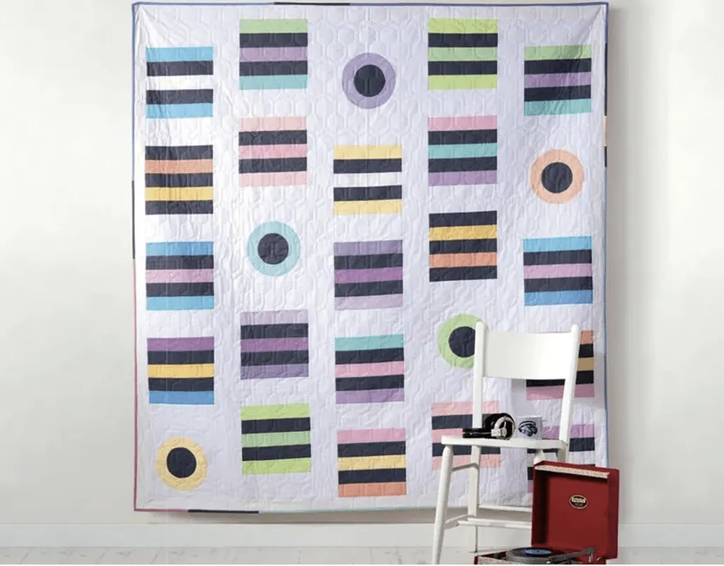 Jelly roll quilt with a pattern that looks like sweets
