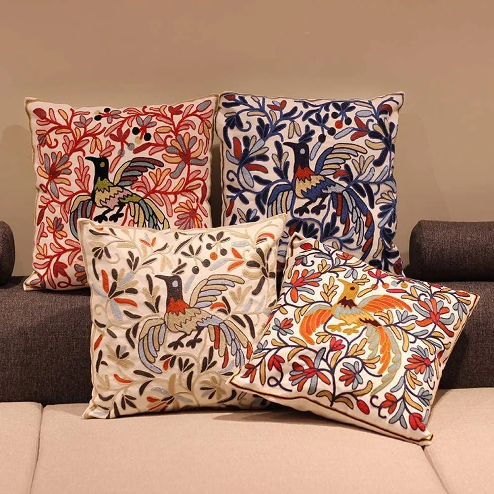 embroidered cushion with bird pattern