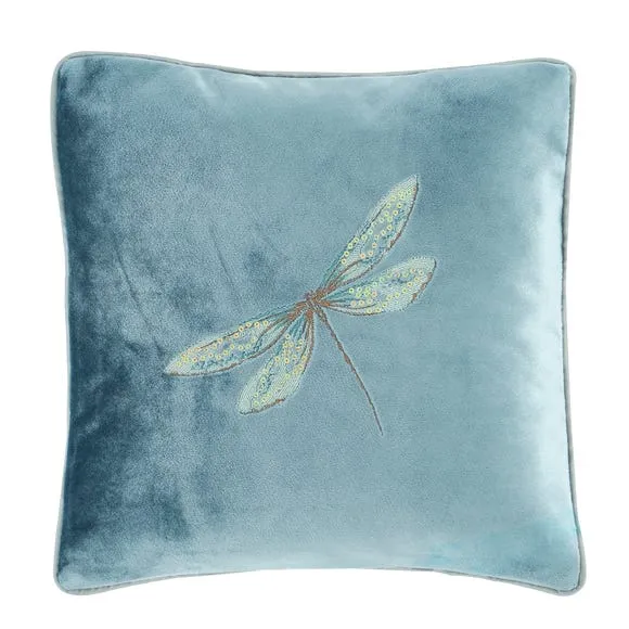 embroidered cushion with dragonfly pattern