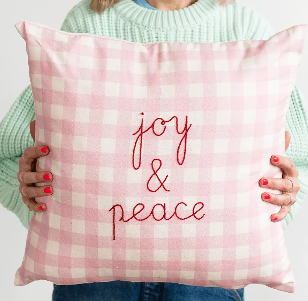 embroidered cushion kit with festive pattern