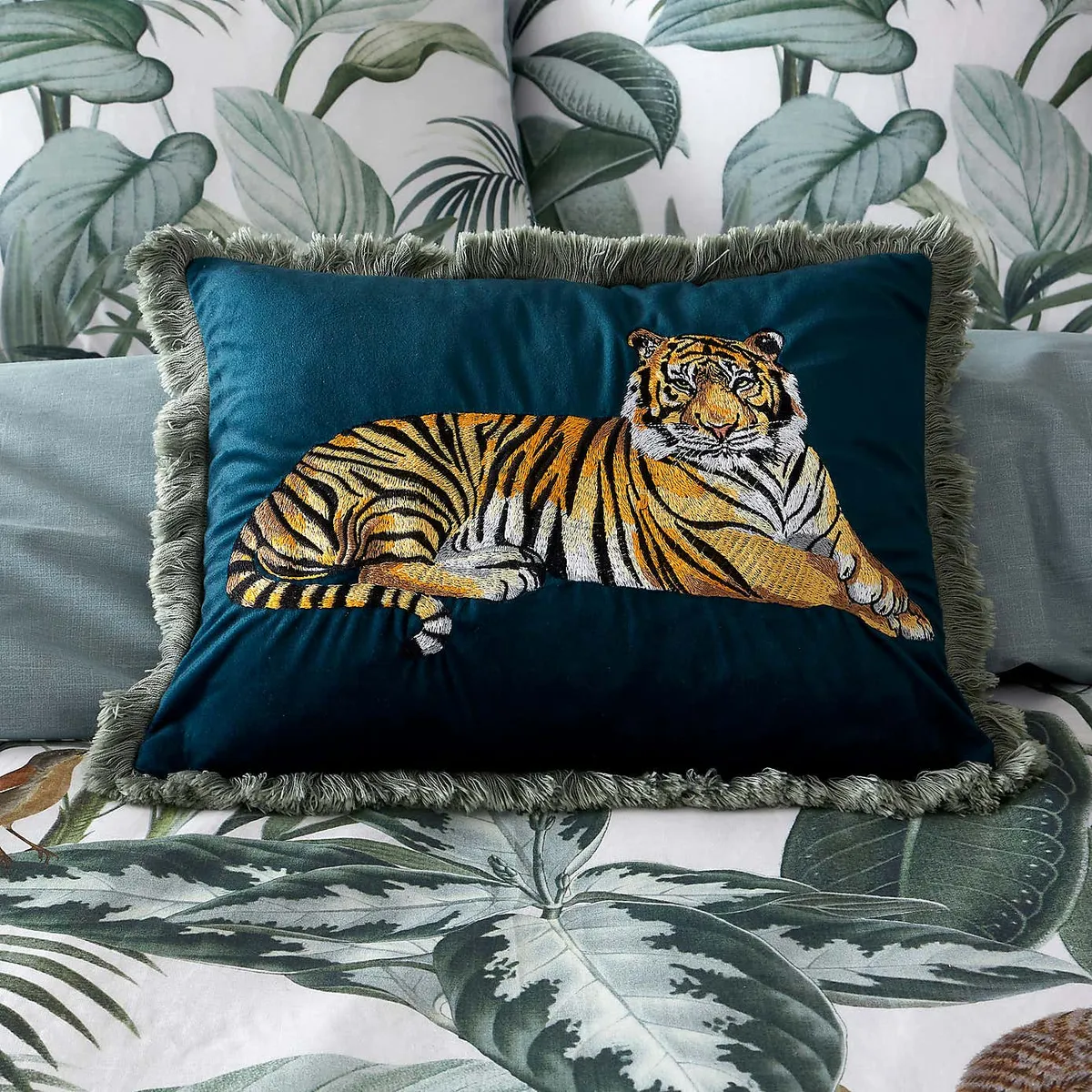 embroidered cushion with tiger pattern