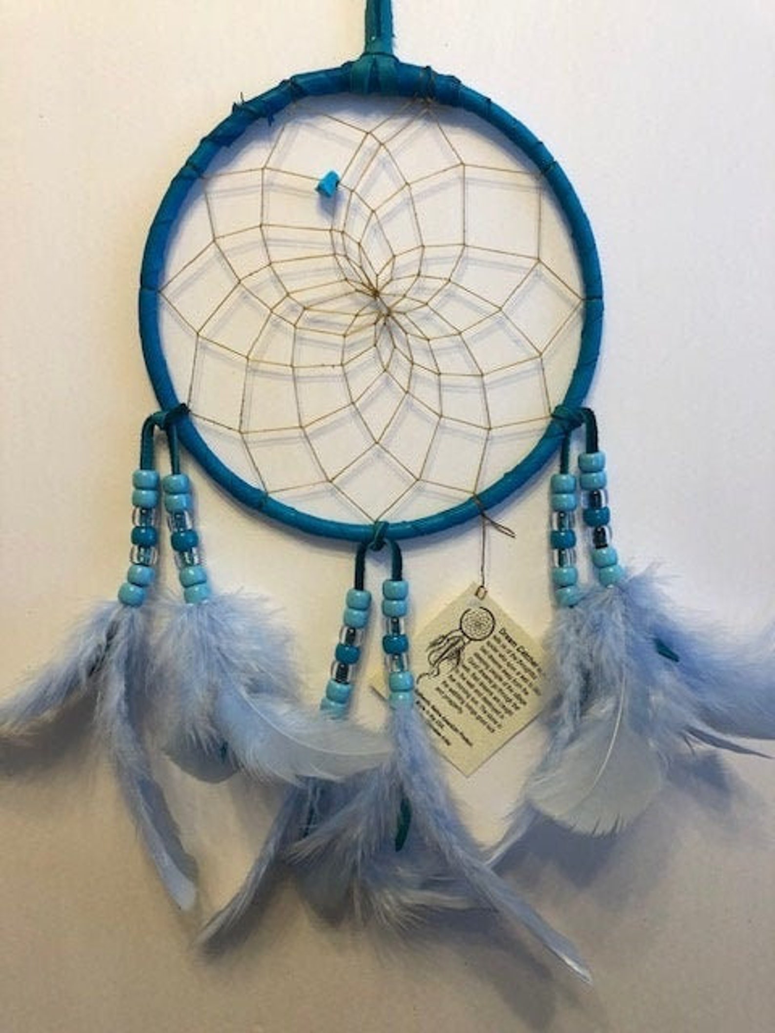 blue hop with woven middle and blue beed and trimmings in an authentic dreamcatcher