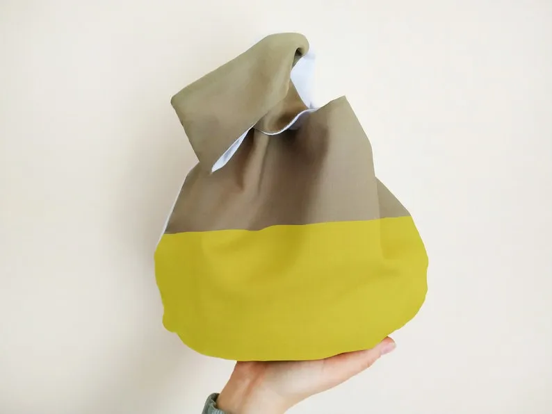 A yellow and beige bag