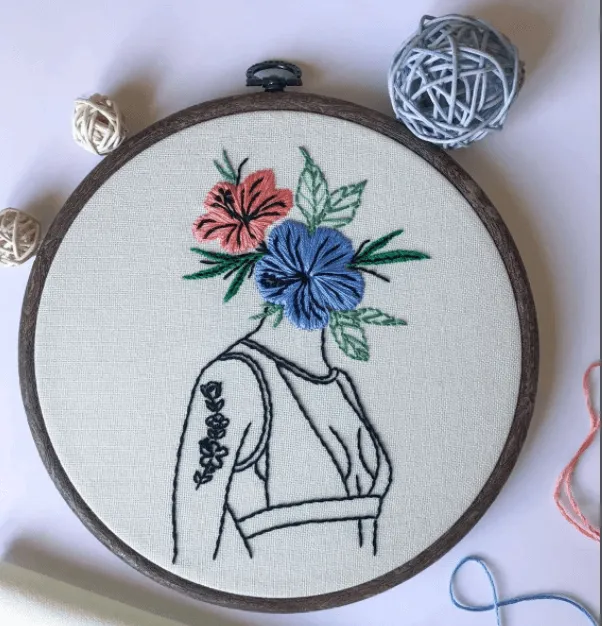 woman with flowers embroidery