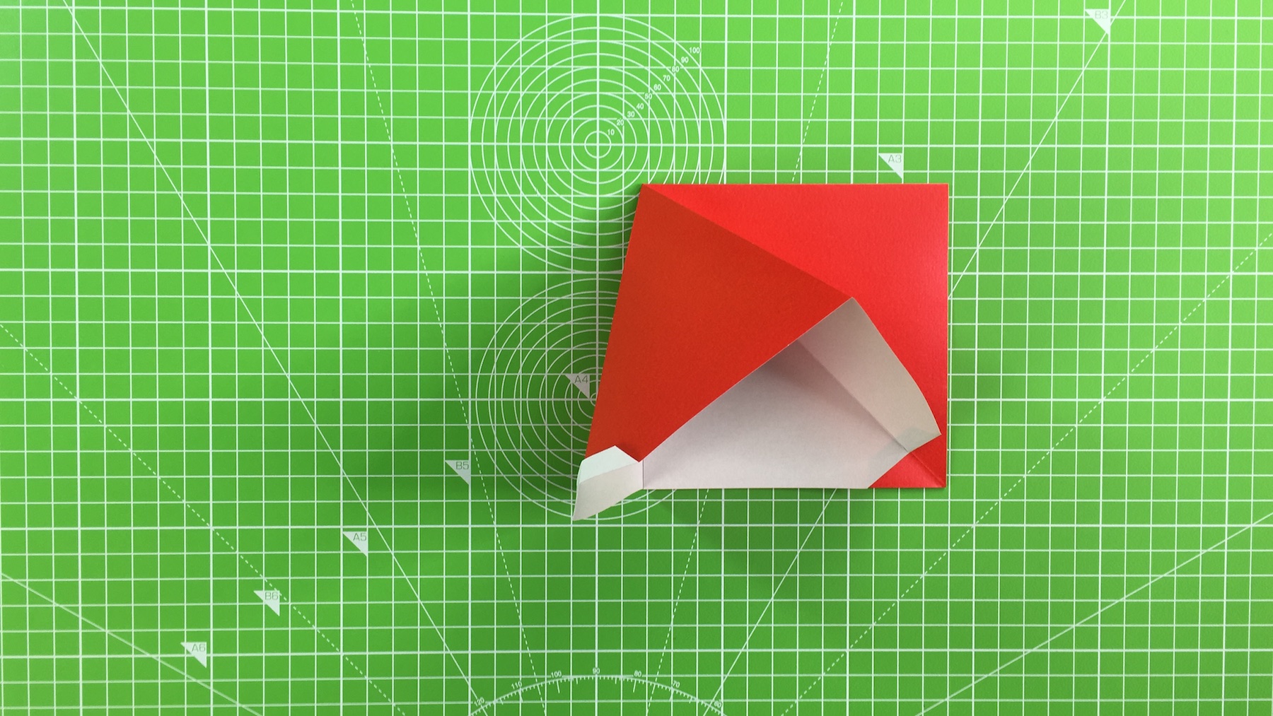 Origami Santa tutorial - how to make an origami Santa, step 12a