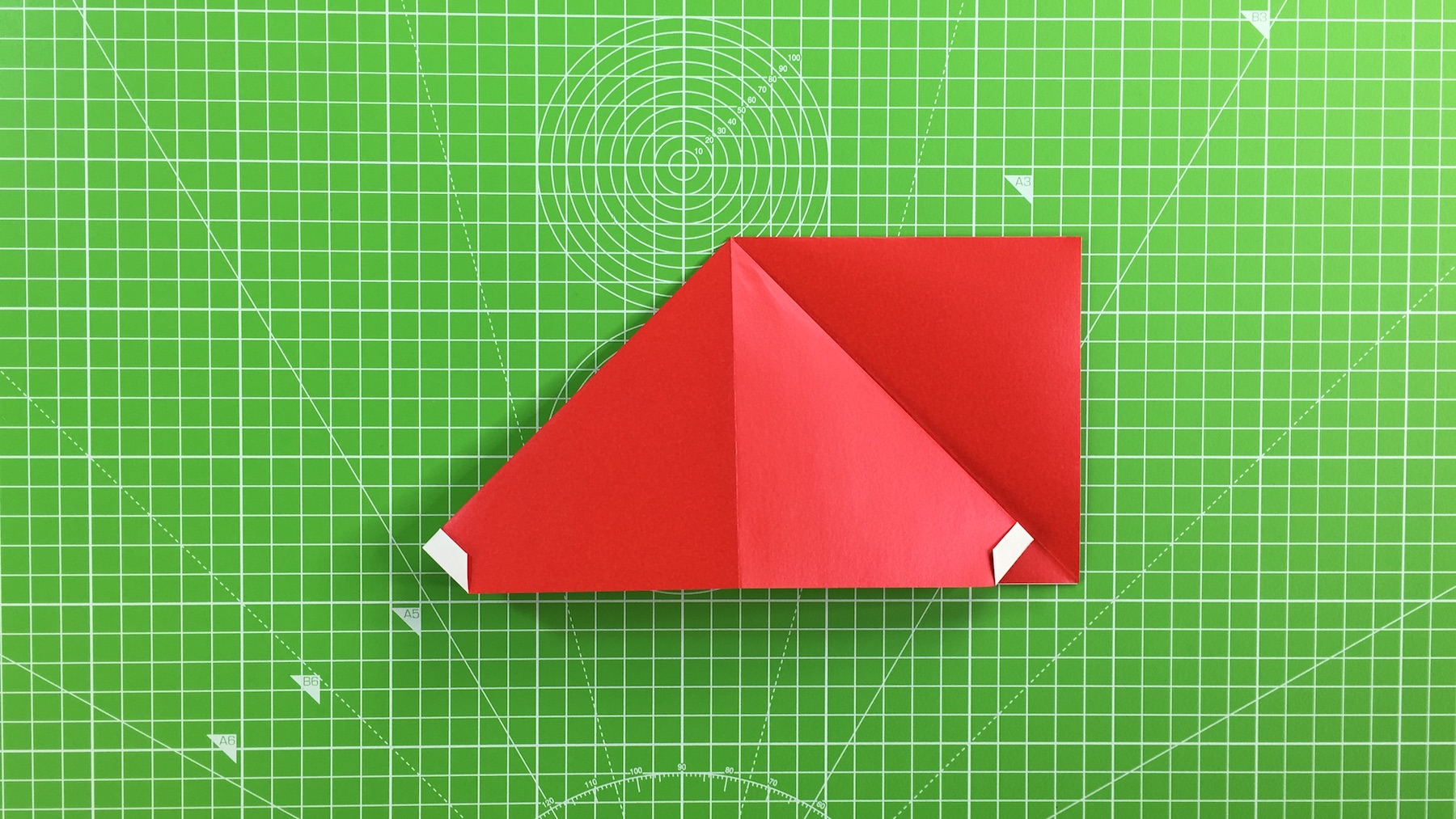 Origami Santa tutorial - how to make an origami Santa, step 12c