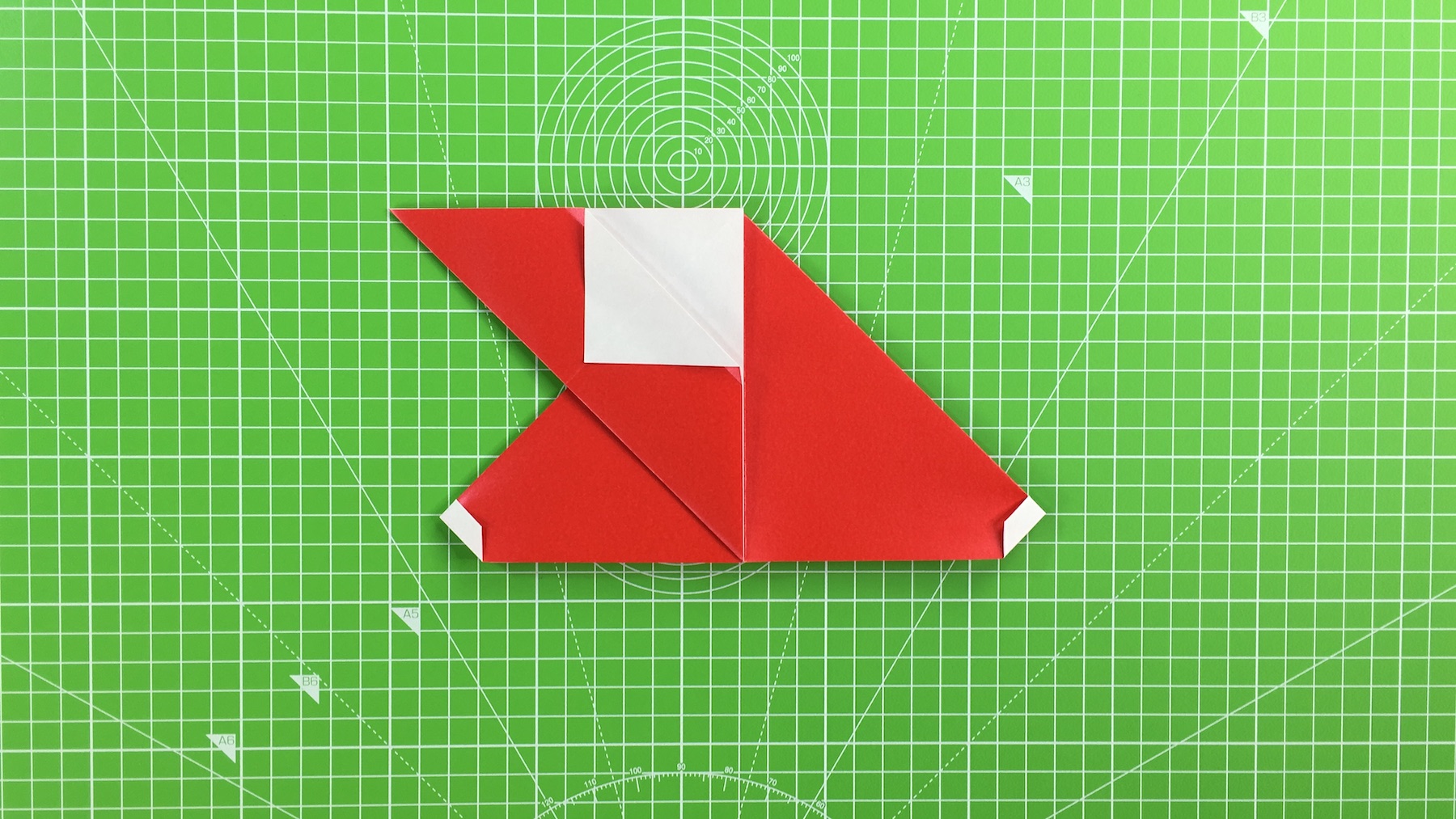 Origami Santa tutorial - how to make an origami Santa, step 16