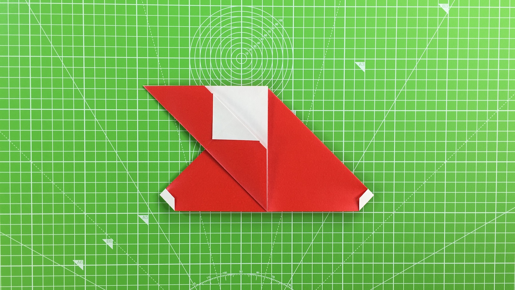 Origami Santa tutorial - how to make an origami Santa, step 17
