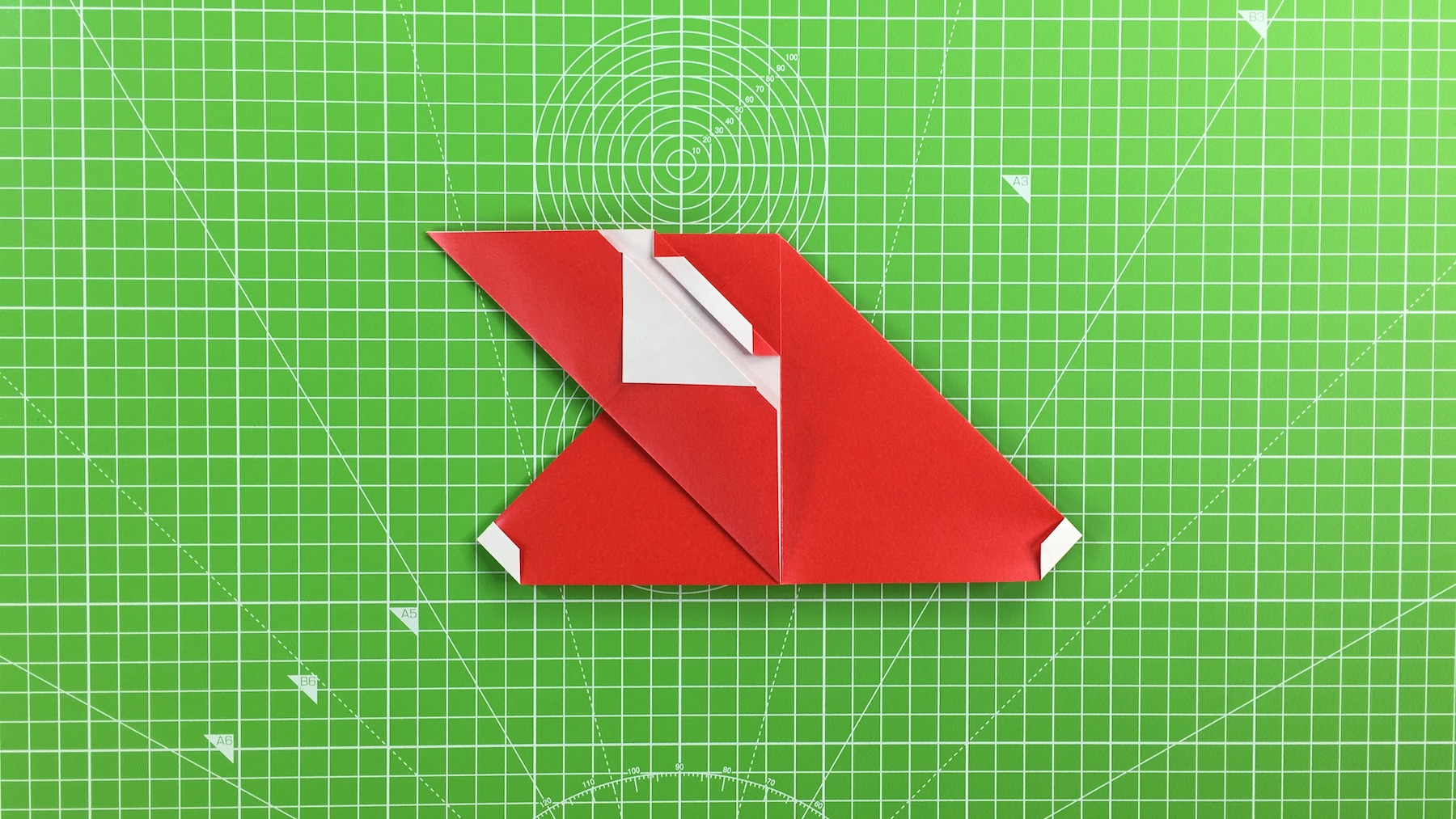 Origami Santa tutorial - how to make an origami Santa, step 21