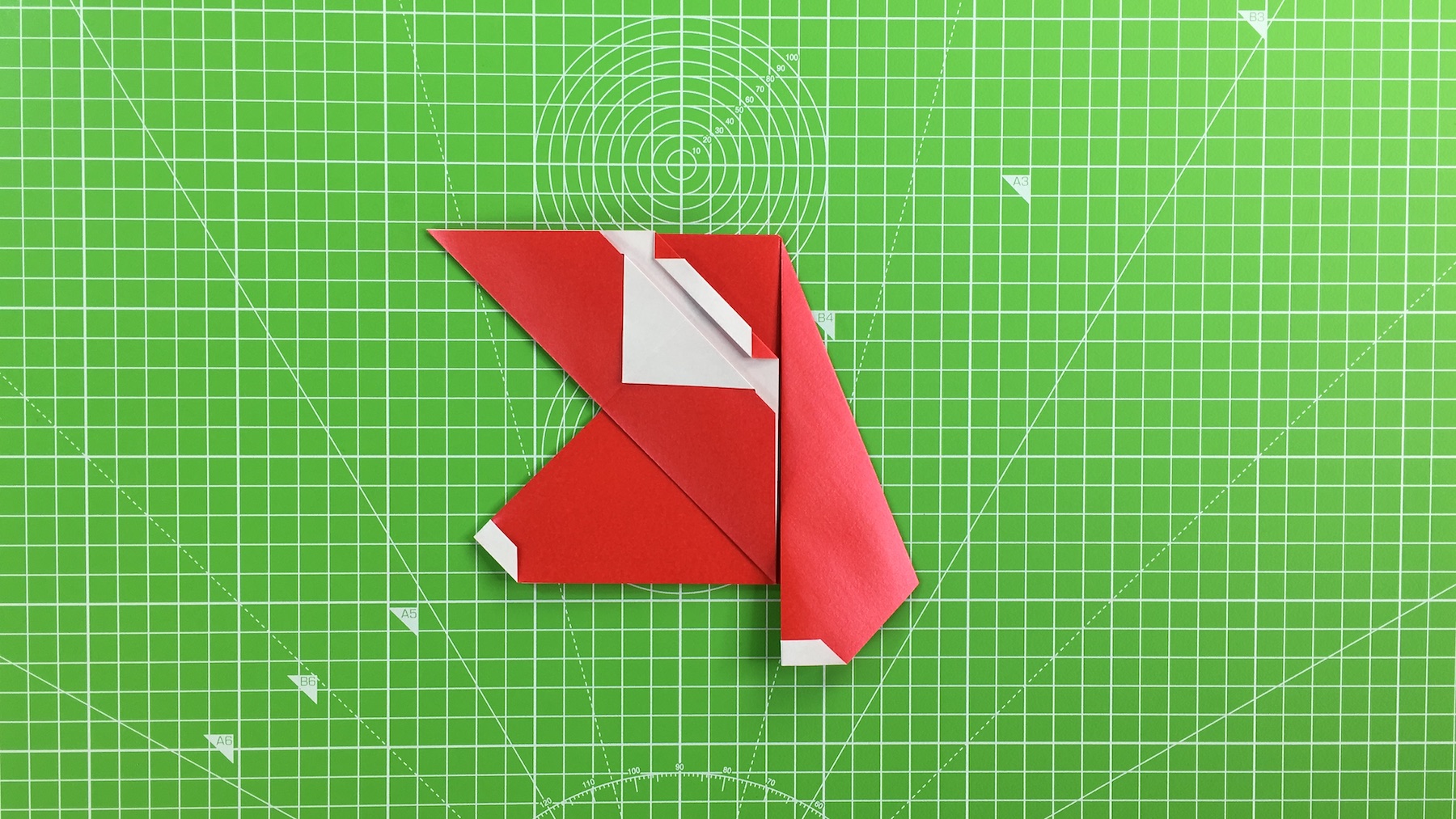 Origami Santa tutorial - how to make an origami Santa, step 22