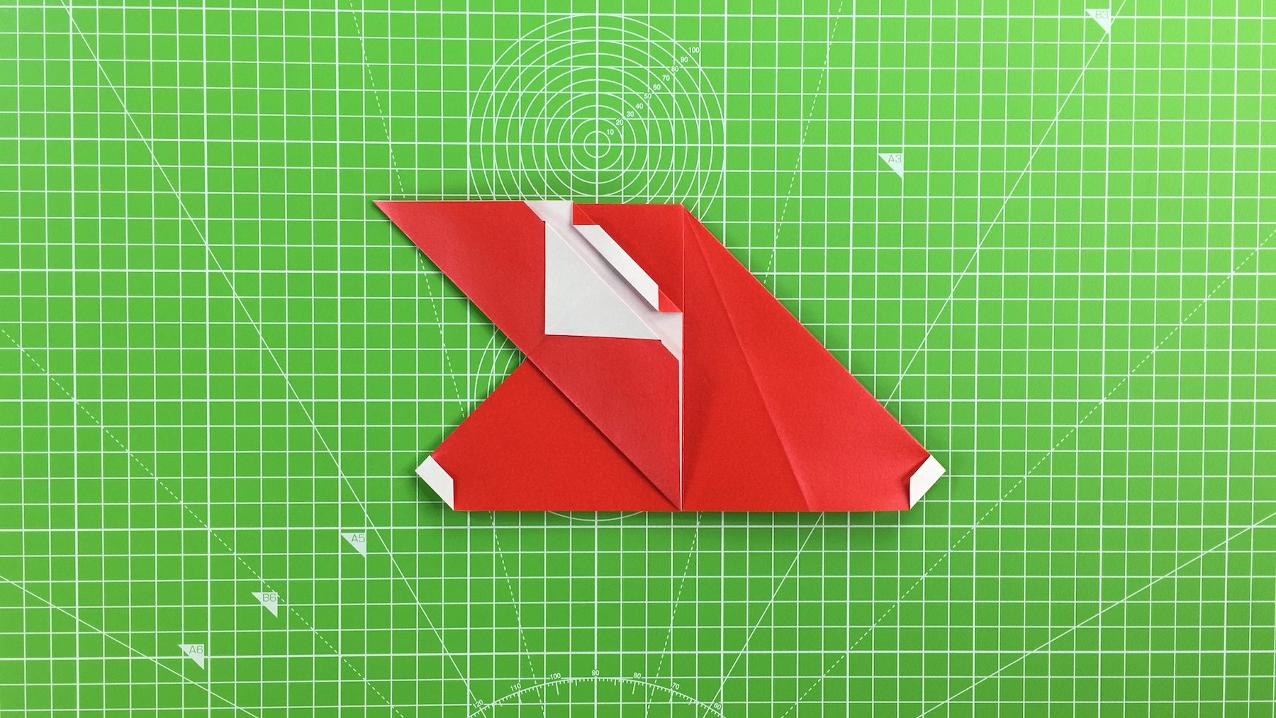 Origami Santa tutorial - how to make an origami Santa, step 23