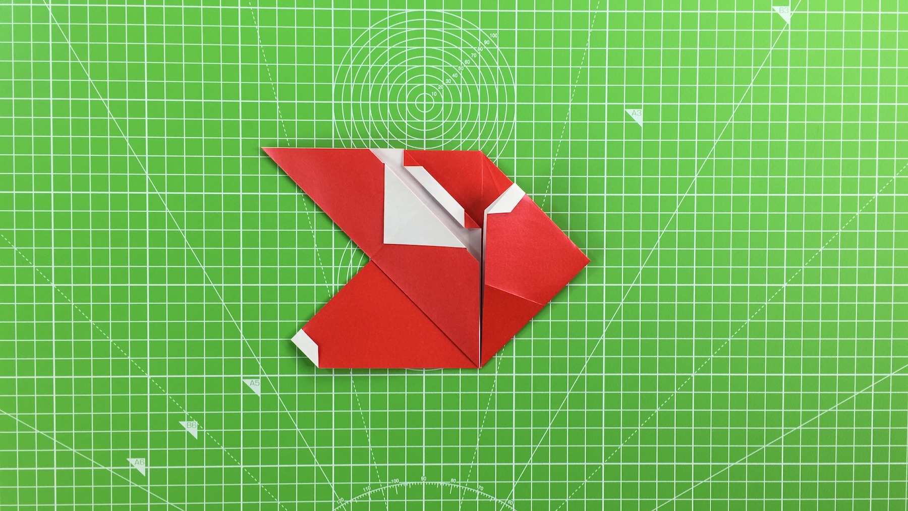 Origami Santa tutorial - how to make an origami Santa, step 24