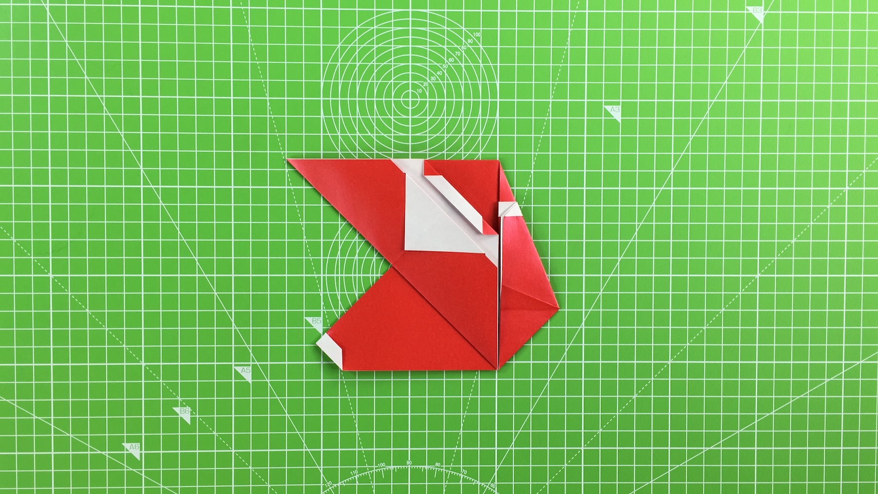 Origami Santa tutorial - how to make an origami Santa, step 27