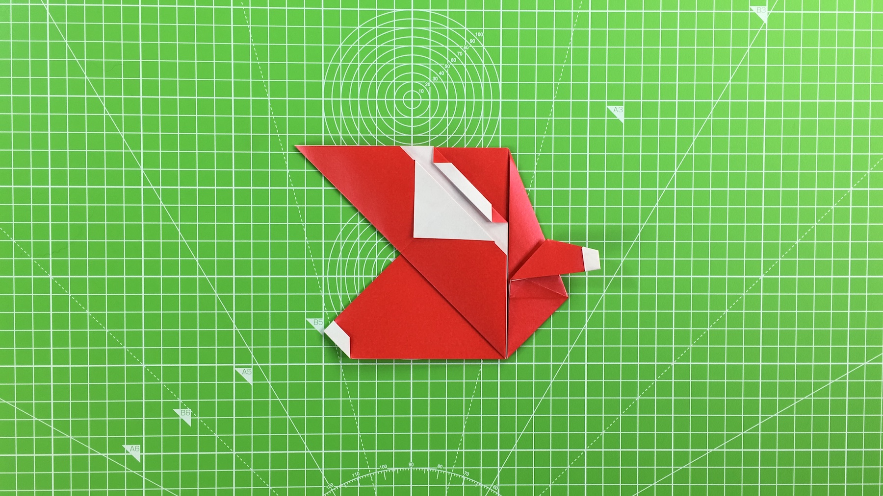 Origami Santa tutorial - how to make an origami Santa, step 28