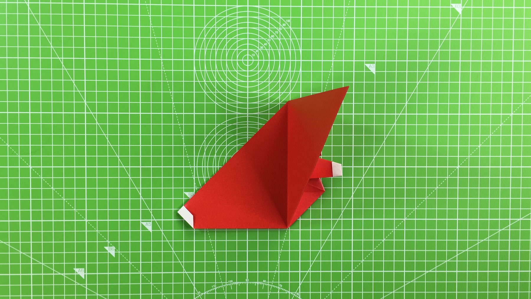 Origami Santa tutorial - how to make an origami Santa, step 29a