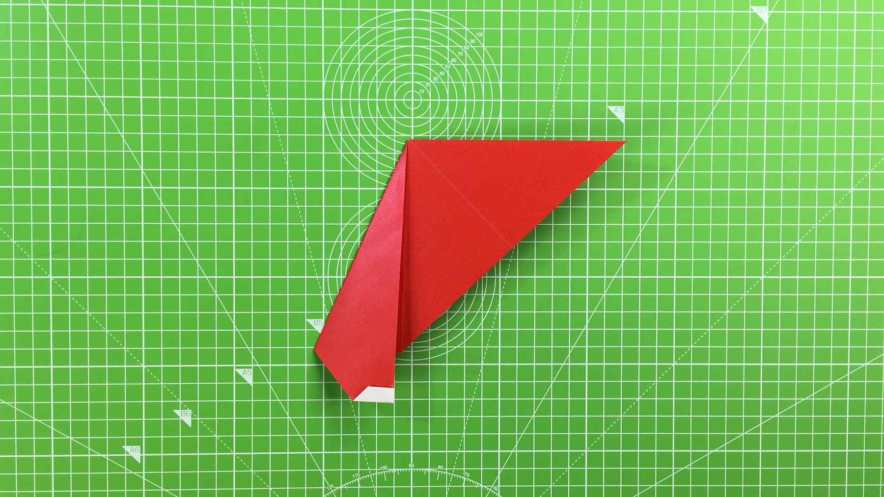 Origami Santa tutorial - how to make an origami Santa, step 30