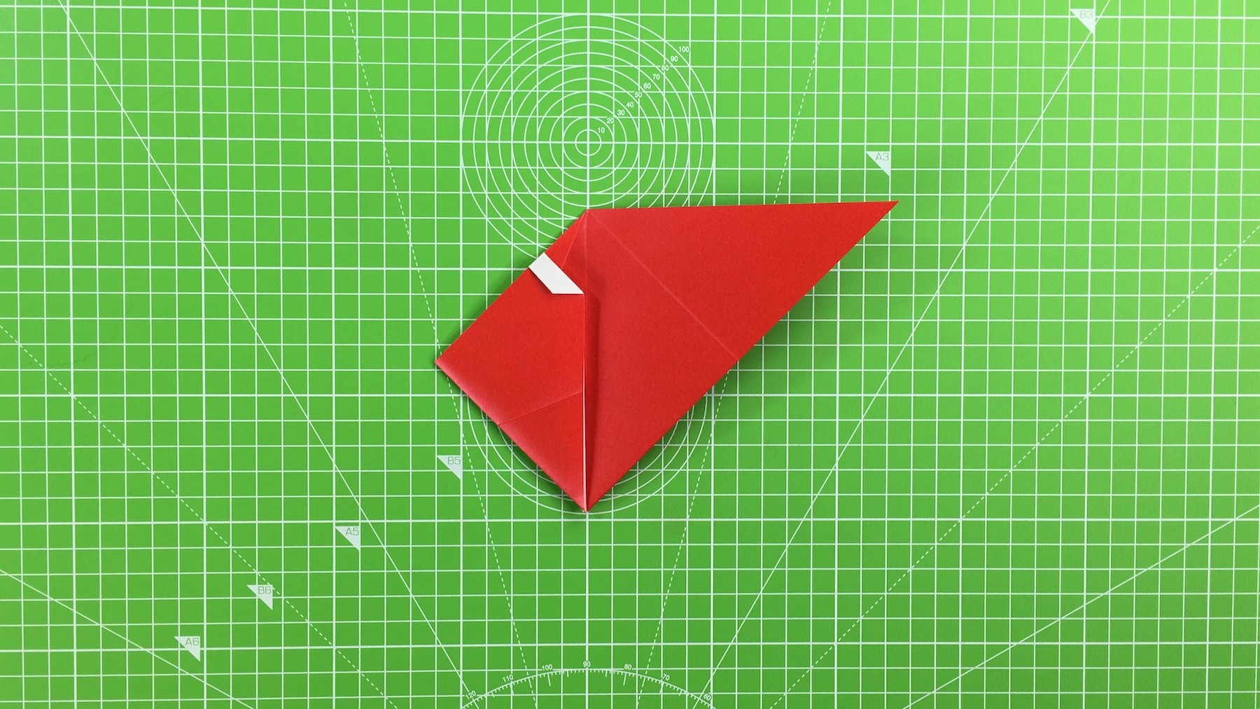 Origami Santa tutorial - how to make an origami Santa, step 32
