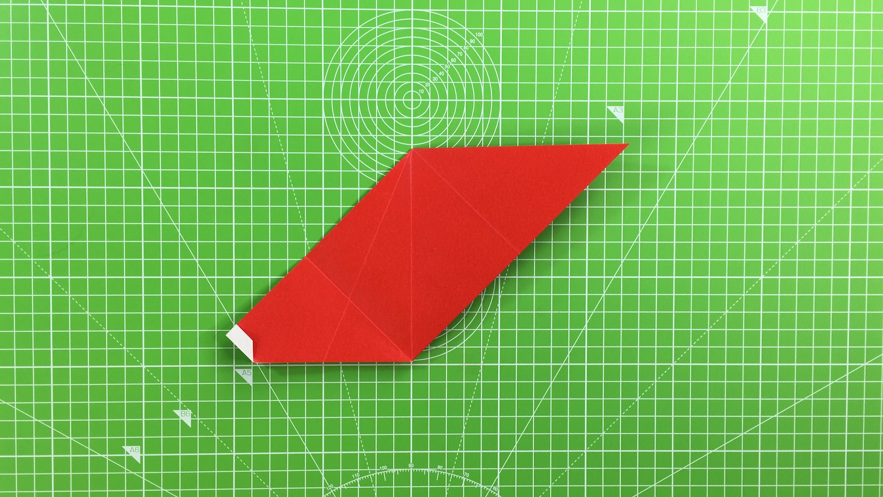 Origami Santa tutorial - how to make an origami Santa, step 33
