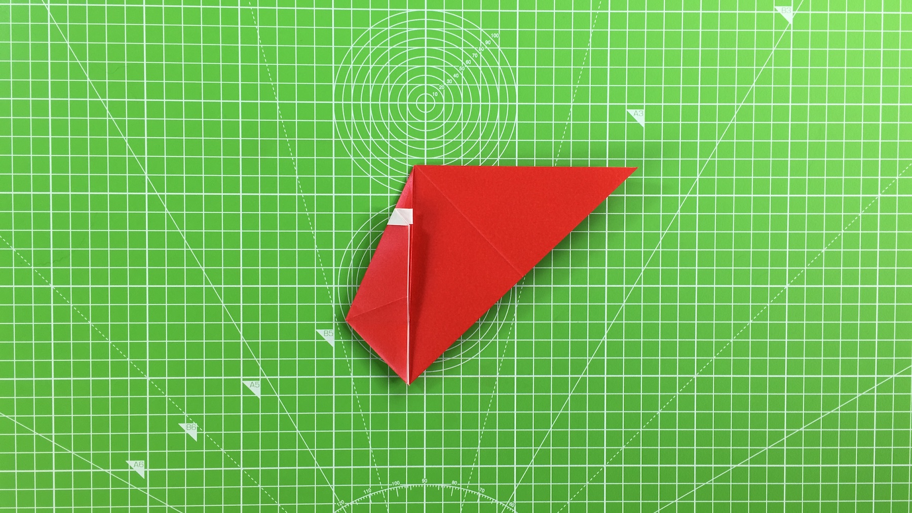 Origami Santa tutorial - how to make an origami Santa, step 35